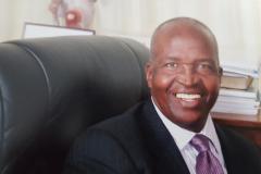 Dr. John P. N. Simba, EGH, MBS, OGW